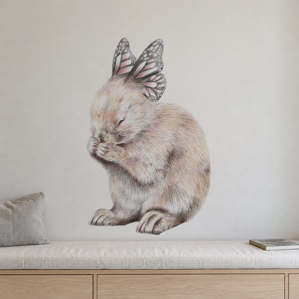 Spring Cleaning by Olivia Bezett, wall decal room mock-up in a living room above a low cabinet.