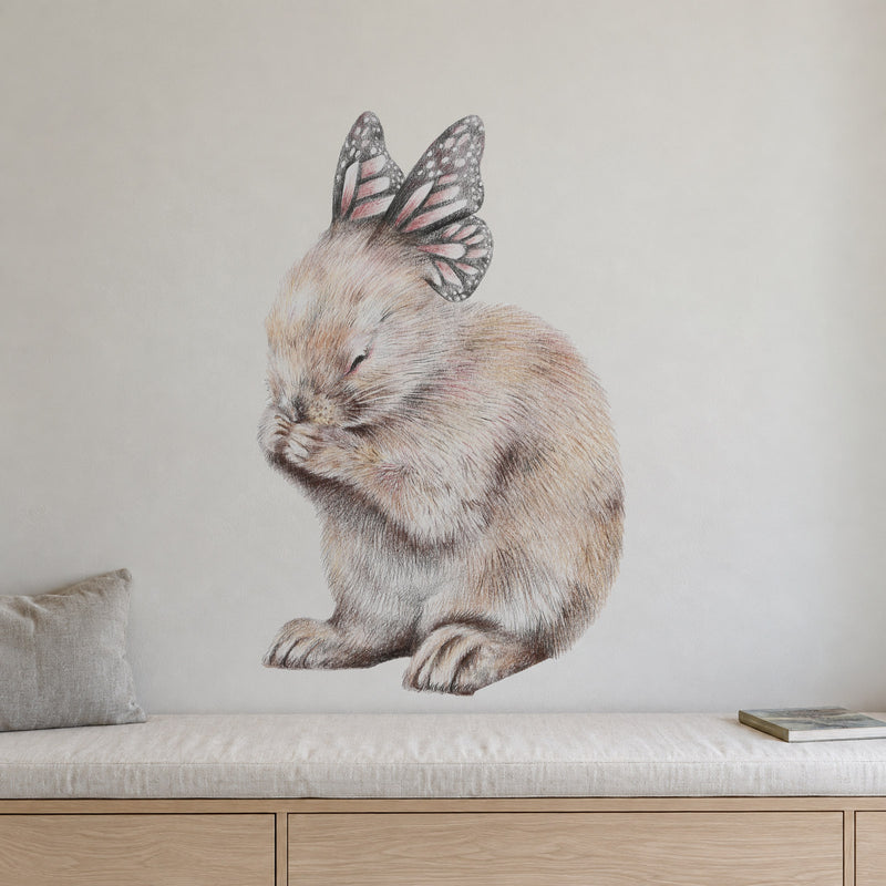 Spring Cleaning by Olivia Bezett, wall decal room mock-up in a living room above a low cabinet.