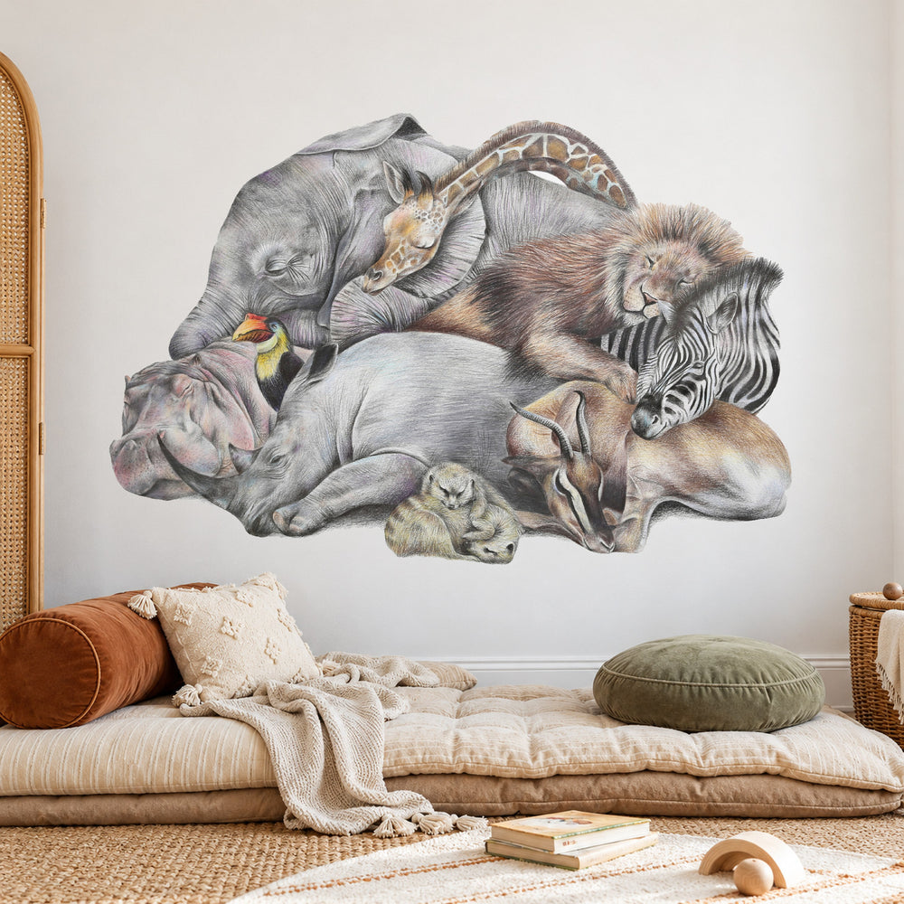 Safari Sleepers by Olivia Bezett, wall decal room mock-up in a living room above a cream sofa.