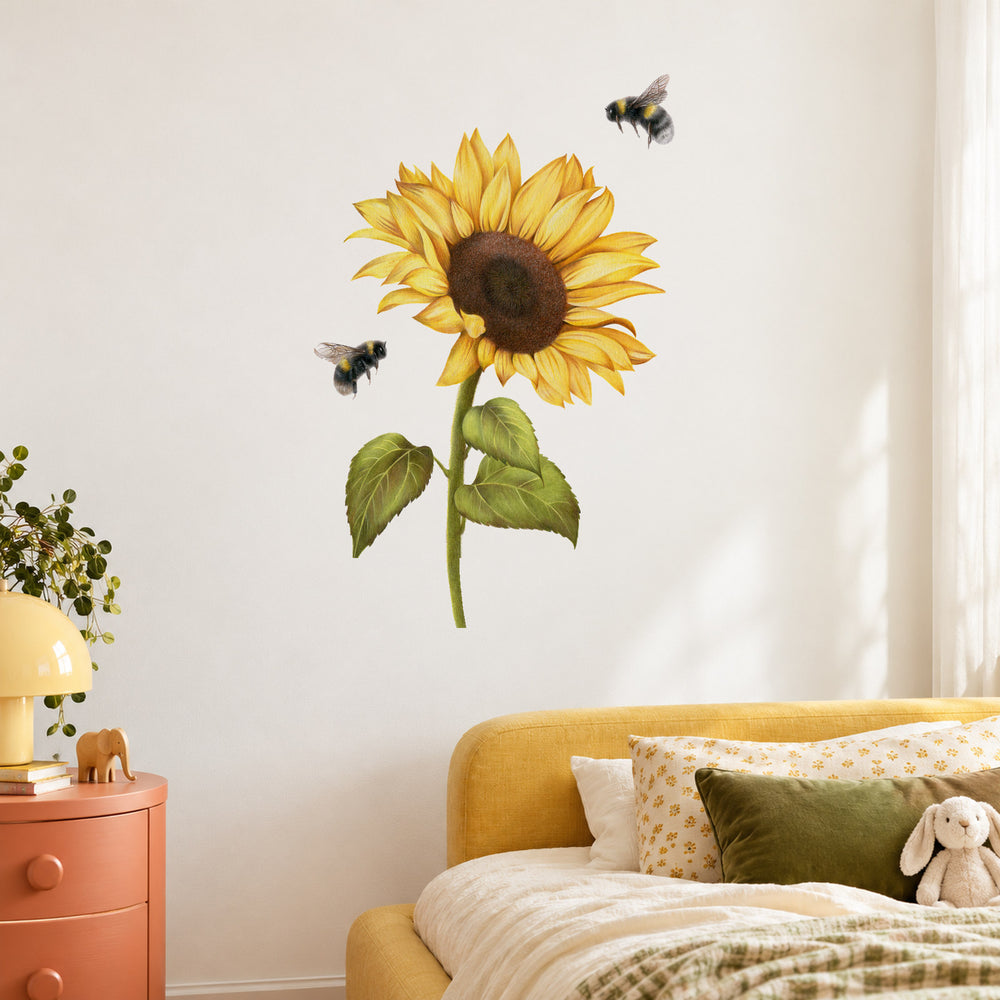 Sunflower and Bees by Olivia Bezett, wall decal room mock-up in a reading corner beside a yellow armchair.