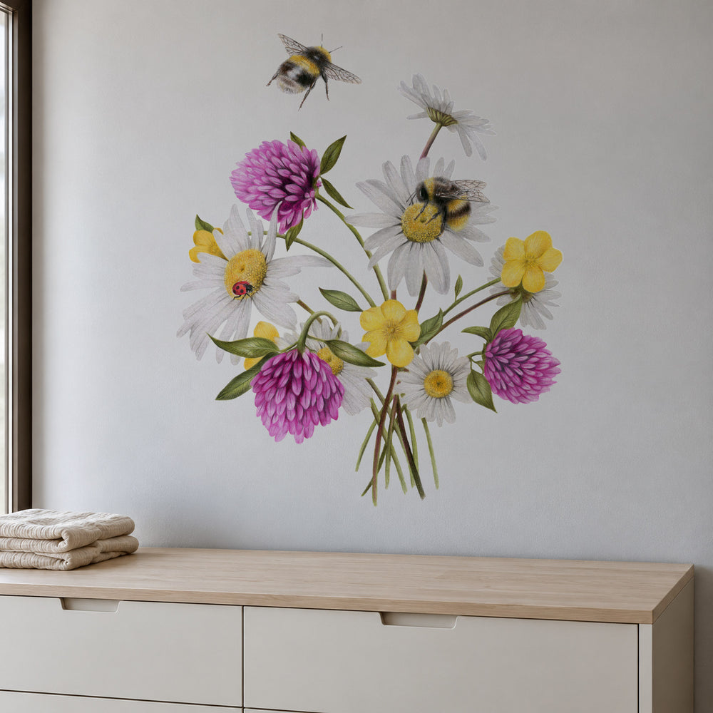 Wildflower Bees by Olivia Bezett, wall decal room mock-up in a room above a low white cabinet.