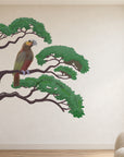 Kākā and branch wall decal in a bright designer room, view 1.