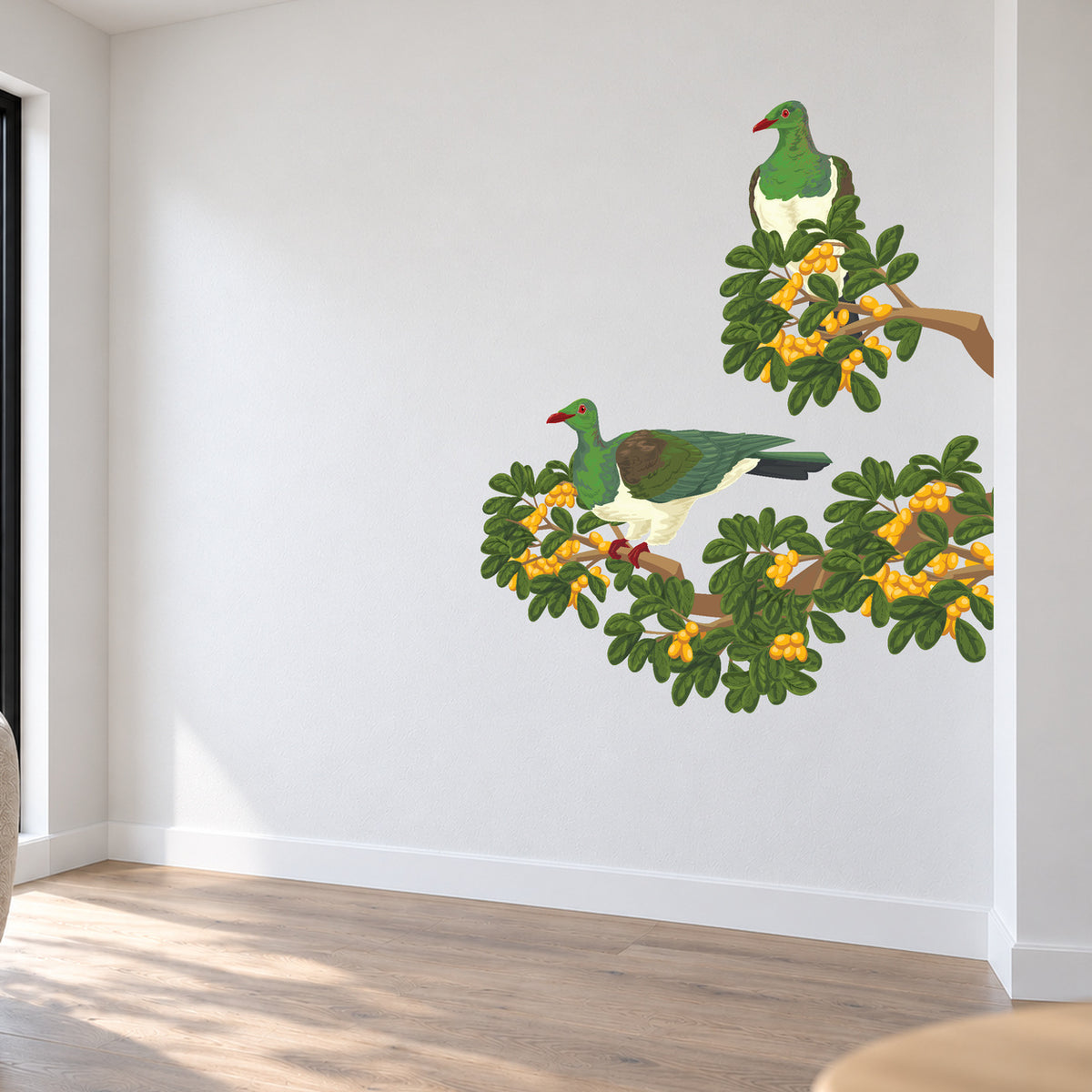 Karaka Branch with Kererū wall decal room visualisation – smaller artwork in a neutral room
