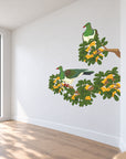 Karaka Branch with Kererū wall decal room visualisation – smaller artwork in a neutral room