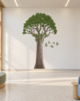 Kauri tree and waxeye flock wall decal in a modern children’s emergency department waiting-area visualization.