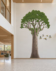 Custom 5 m Kauri tree wall decal installation visualization beside a large opening; not a standard 3 m product size.