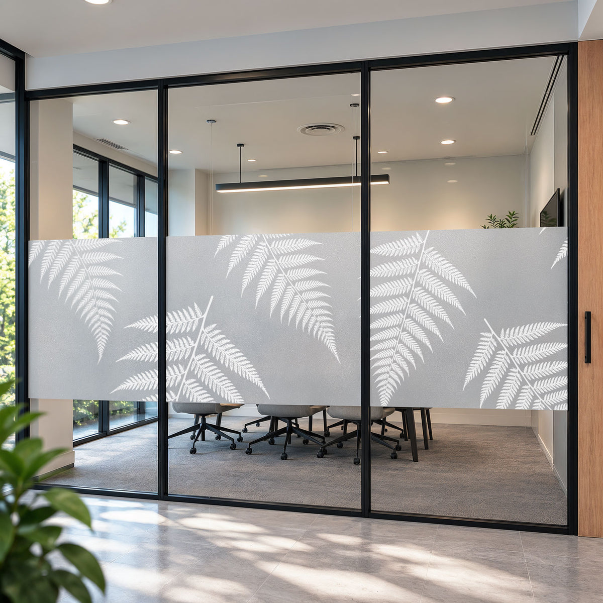Native Fern Frosted Wall Decal used as privacy window film on a meeting room glass wall