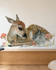Bambi by Olivia Bezett, wall decal room mock-up in a bedroom above a timber chest.