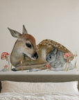 Bambi by Olivia Bezett, wall decal room mock-up in a bedroom above a grey headboard.