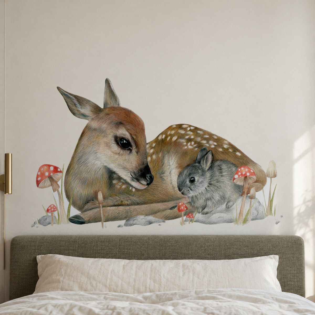 Bambi by Olivia Bezett, wall decal room mock-up in a bedroom above a grey headboard.