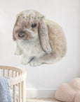 Daisy Bunny by Olivia Bezett, wall decal room mock-up in a nursery with pale timber furniture.