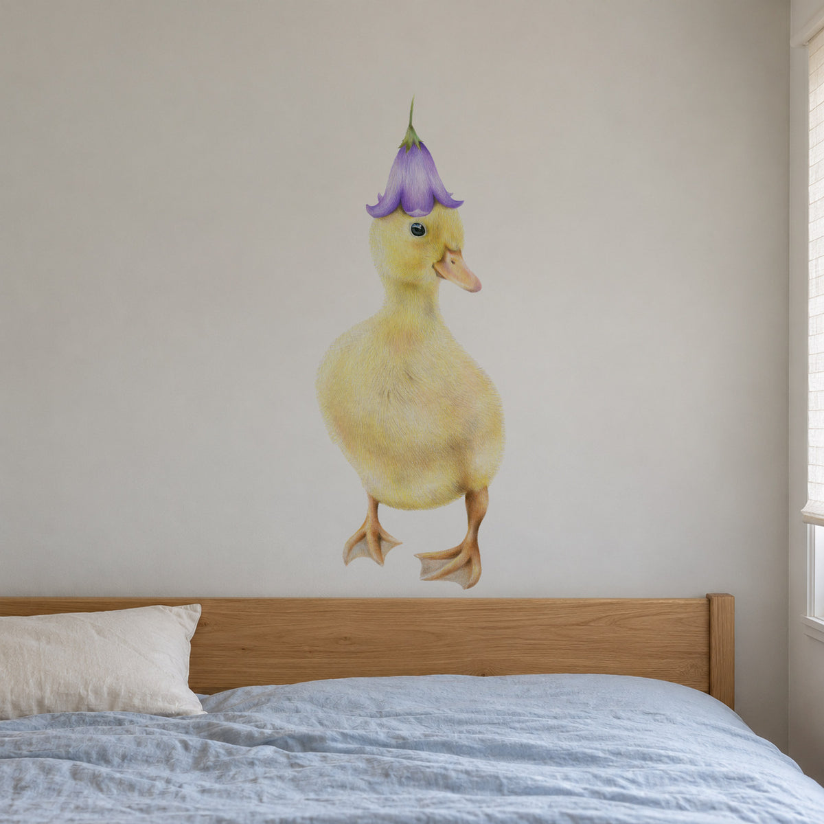 Duckling by Olivia Bezett, wall decal room mock-up in a bedroom above a timber bed.