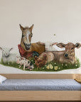Farm Friends by Olivia Bezett, wall decal room mock-up in a bedroom above a blue daybed.