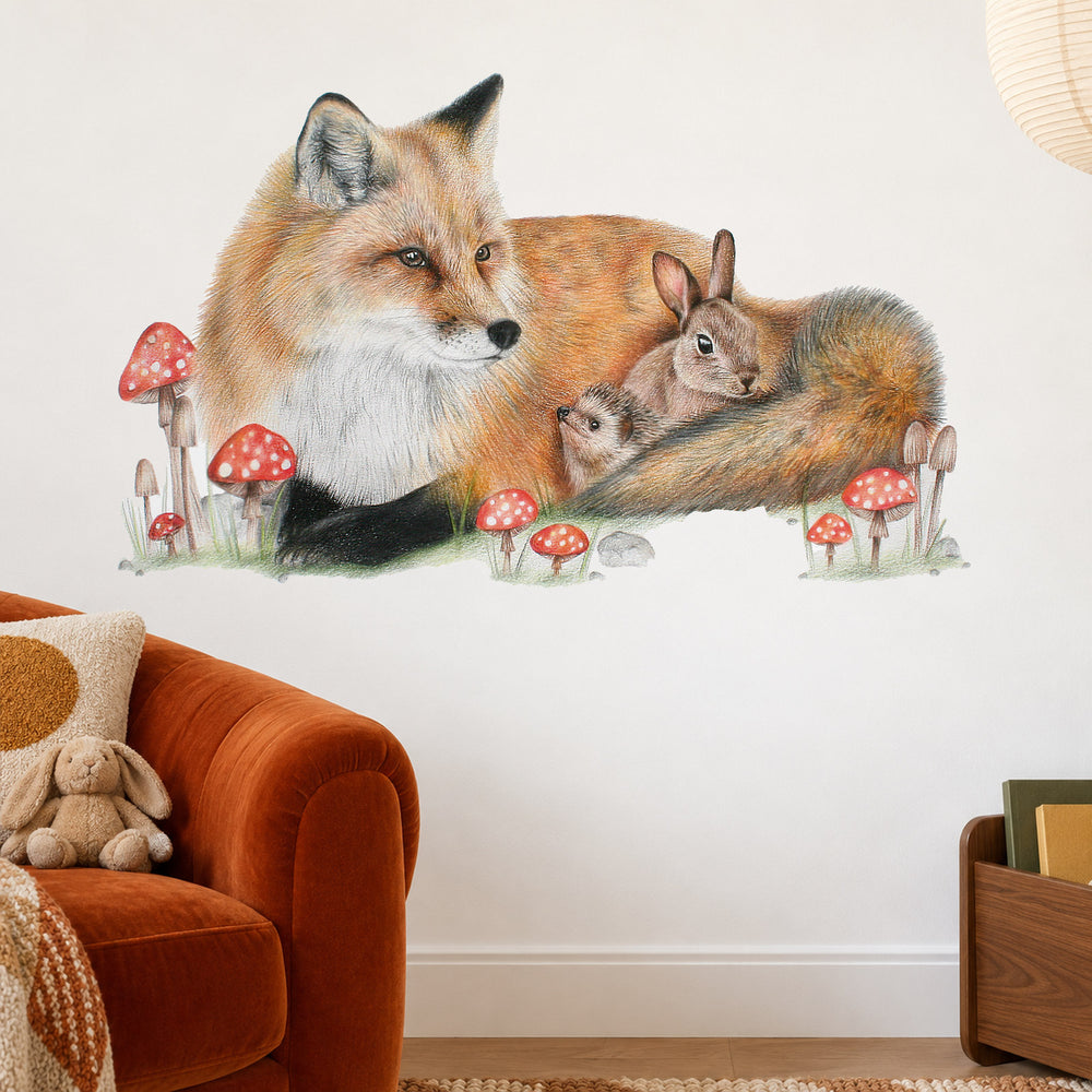Fox & Friends by Olivia Bezett, wall decal room mock-up in a reading corner beside an orange armchair.