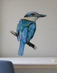 Kōtare by Olivia Bezett, wall decal room mock-up in a room above a low white cabinet.