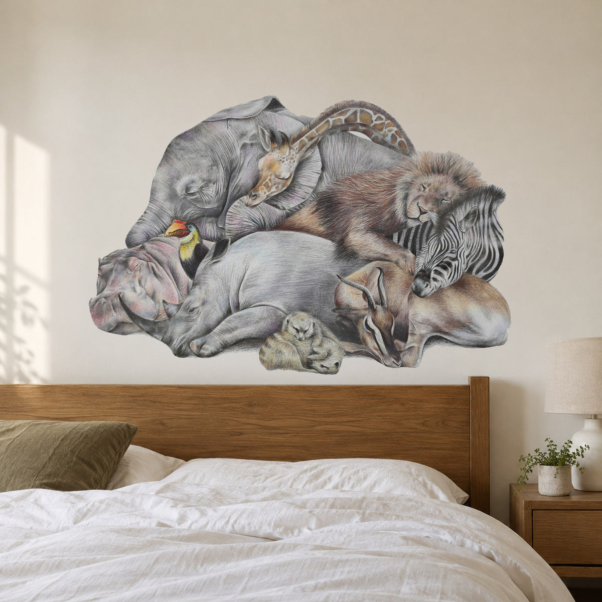 Safari Sleepers by Olivia Bezett, wall decal room mock-up in a bedroom above a timber bed.