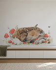 Sleeping Doe by Olivia Bezett, wall decal room mock-up in a room above a pale green cabinet.
