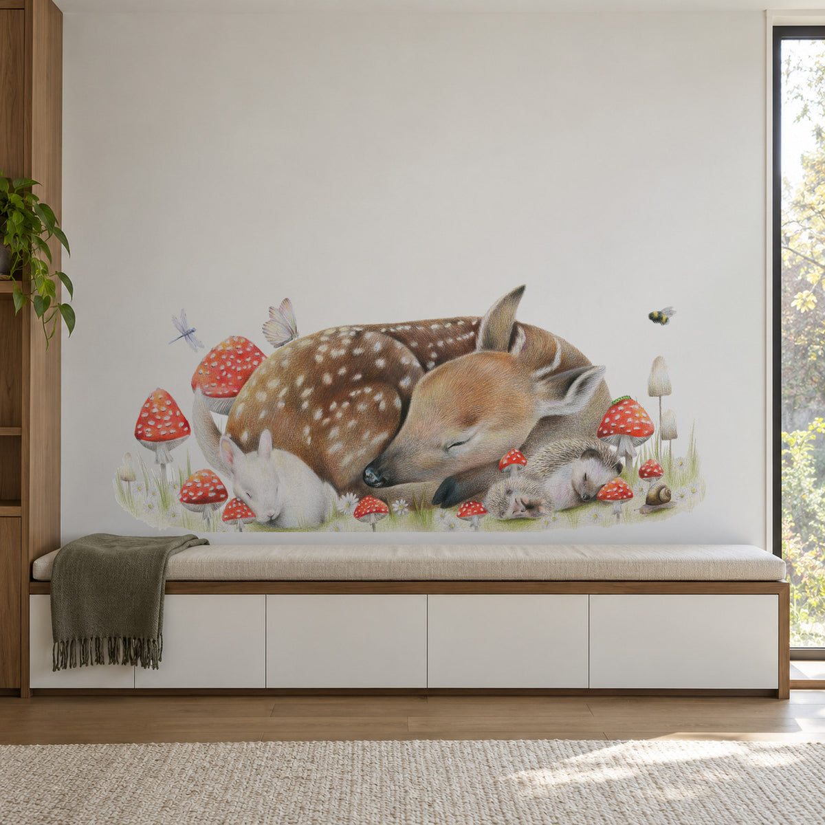Sleeping Doe by Olivia Bezett, wall decal room mock-up in a room above a pale green cabinet.