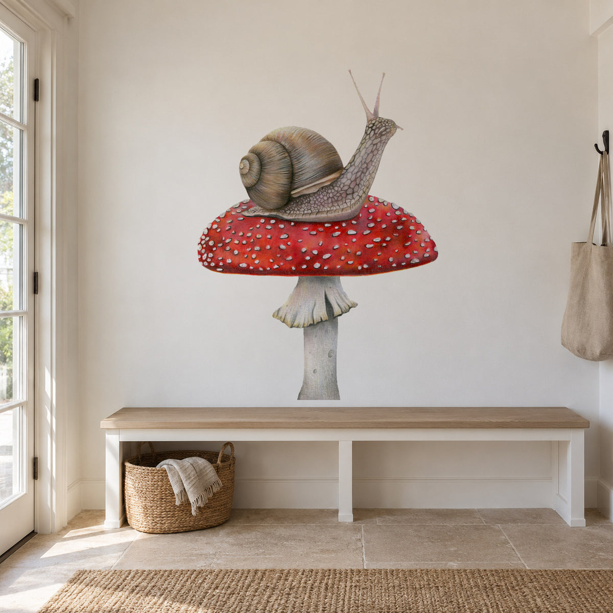 Snail on Mushroom by Olivia Bezett, wall decal room mock-up in a room above a white desk.