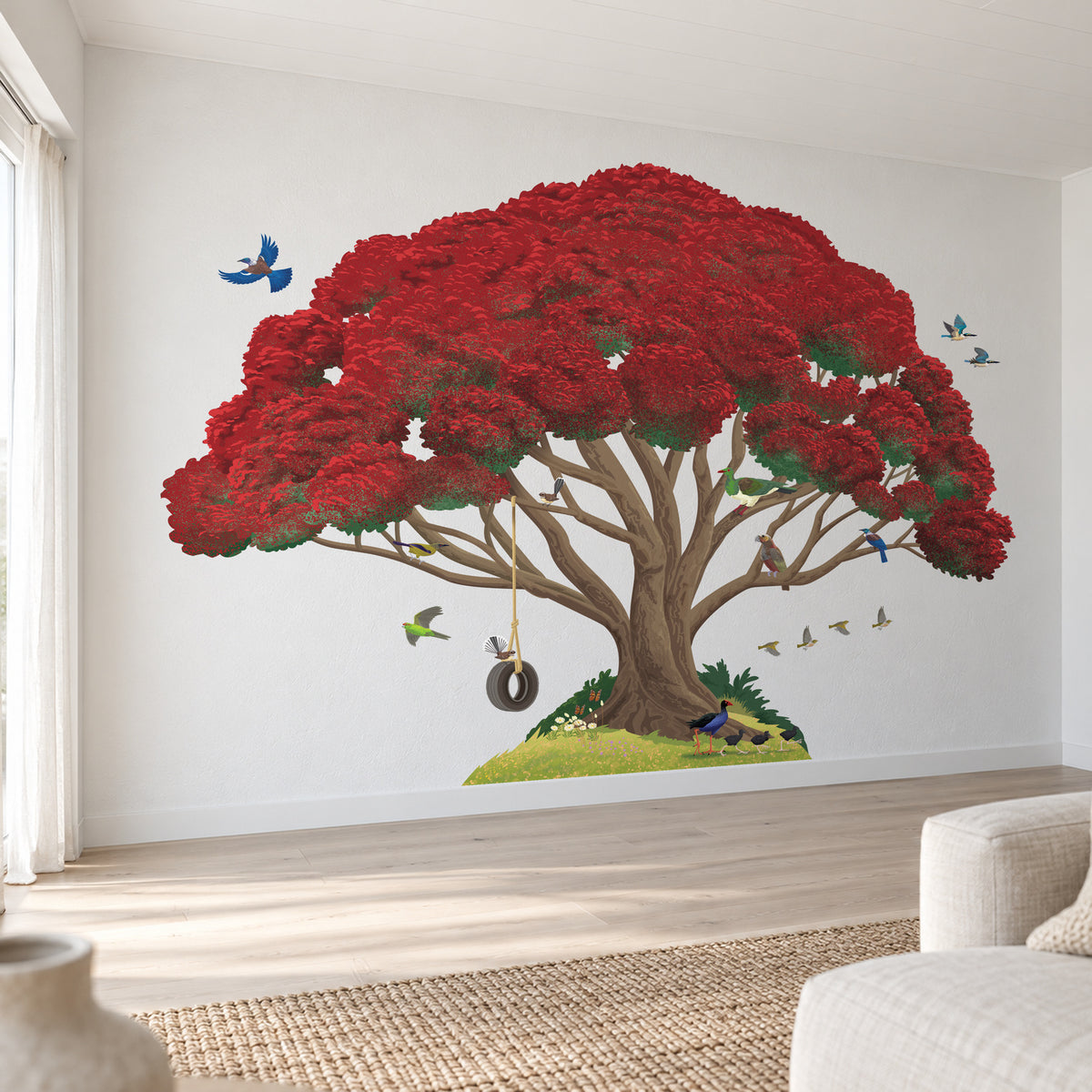 Complete flowering pōhutukawa tree wall decal with swing and birds in a coastal room.