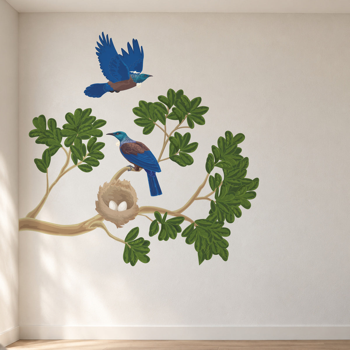 Tūī nest and leafy branch wall decal in a bright designer room, view 1.