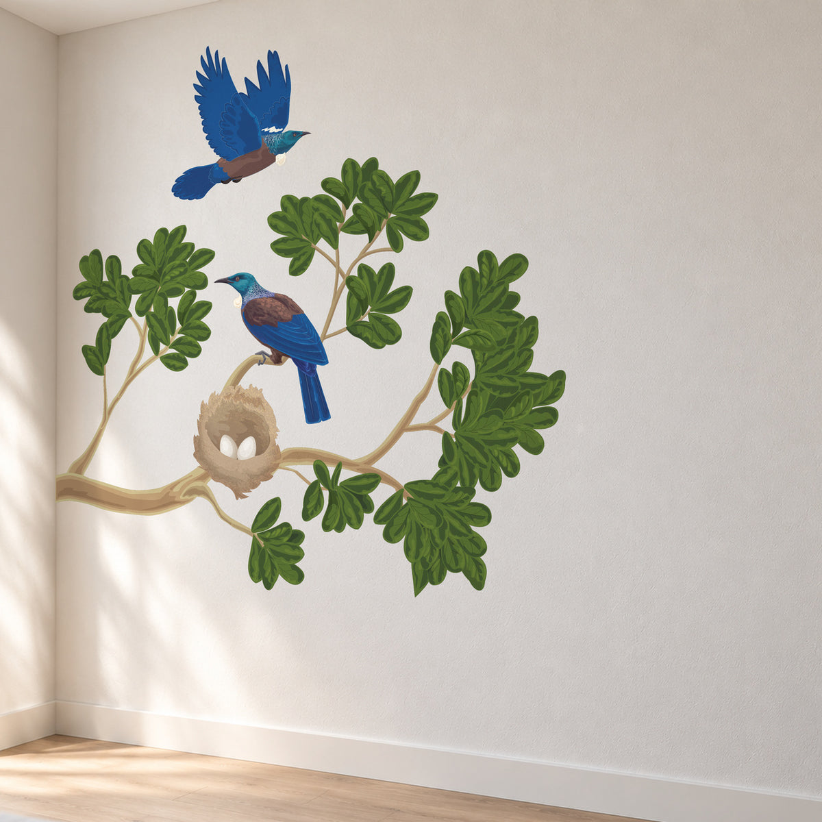 Tūī nest and leafy branch wall decal in a bright designer room, view 2.